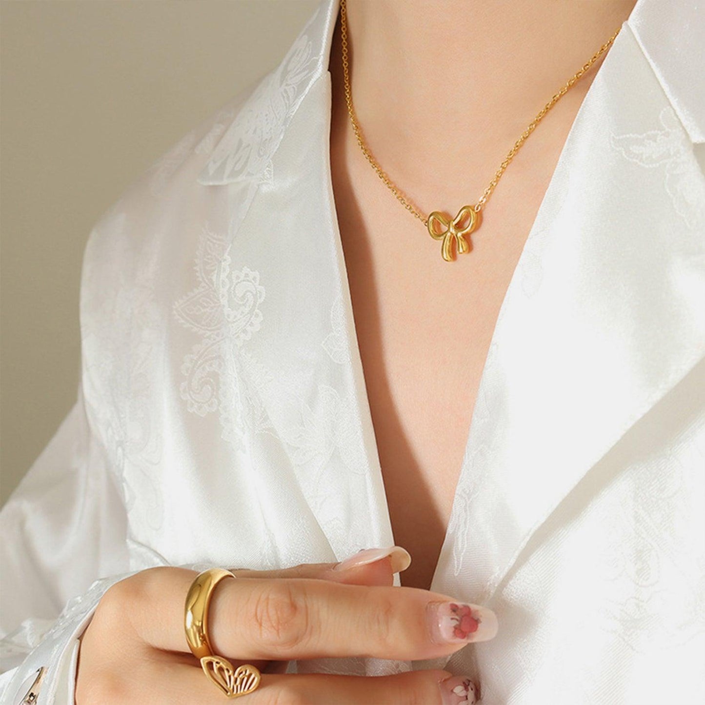 Gold-Plated Titanium Steel Bow Pendant Necklace Carauana Store