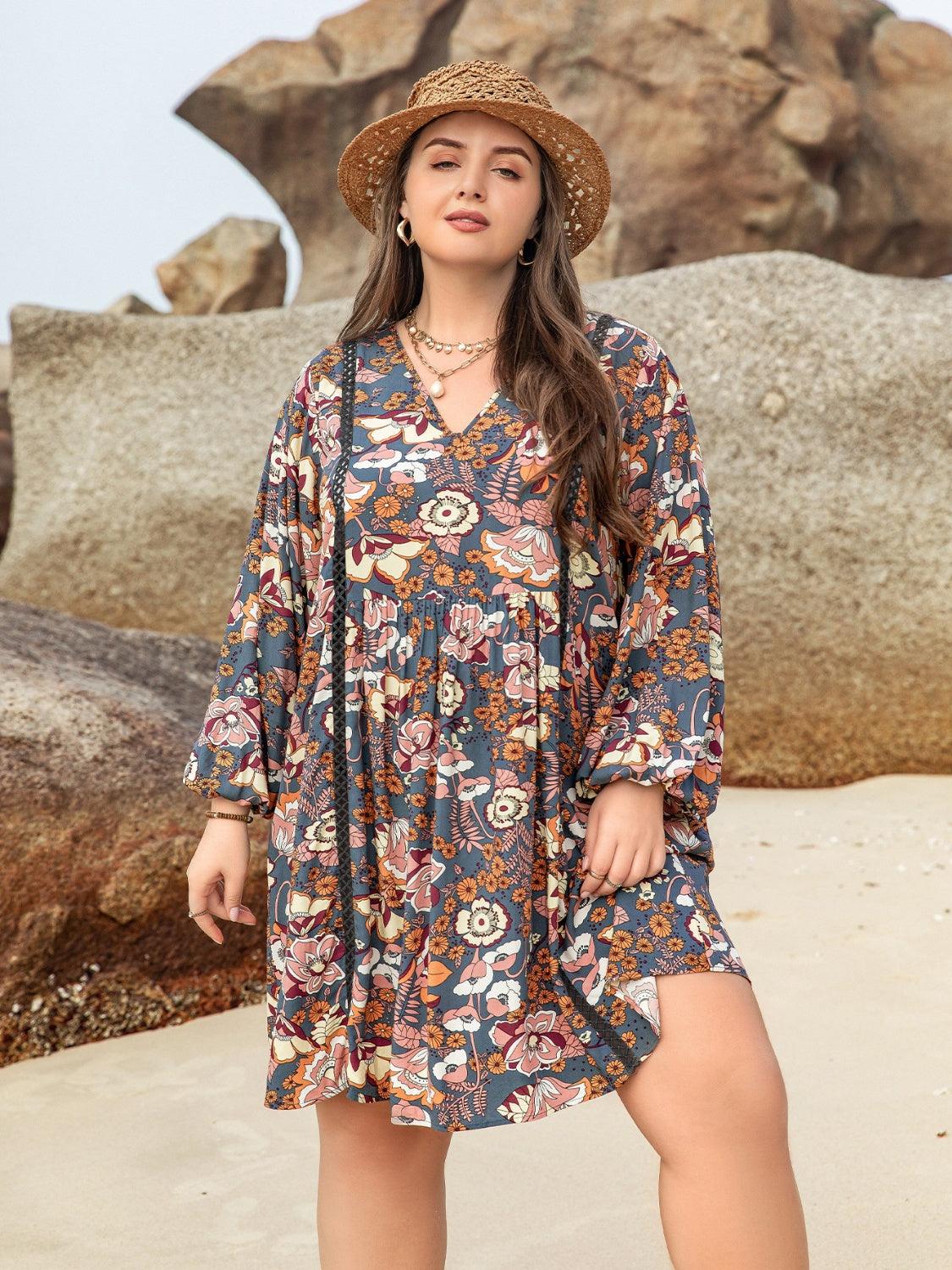 Plus Size Printed V-Neck Balloon Sleeve Mini Dress Carauana Store