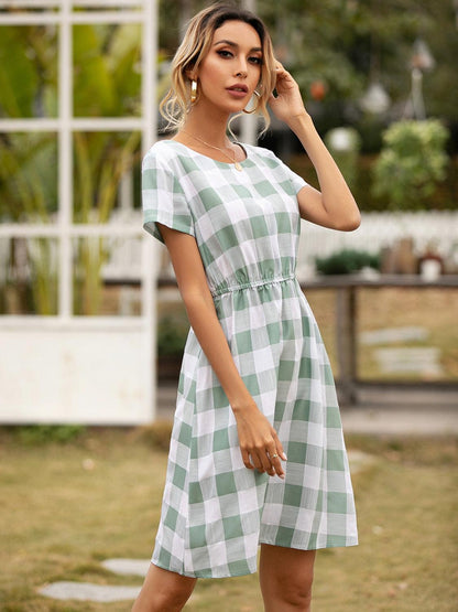 Smocked Plaid Round Neck Short Sleeve Dress Carauana Store